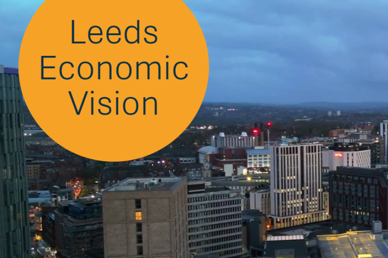 Leeds Economic Vision logo over a backdrop of the skyline of Leeds